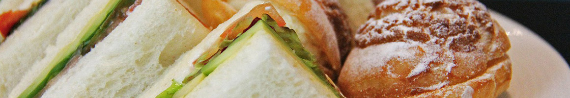 Eating Deli Sandwich at Newton Street Market & Deli restaurant in Waltham, MA.